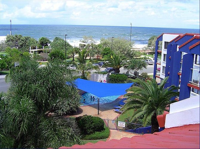 Casablanca Beachfront Apartments building, pool and Kings Beach across the road